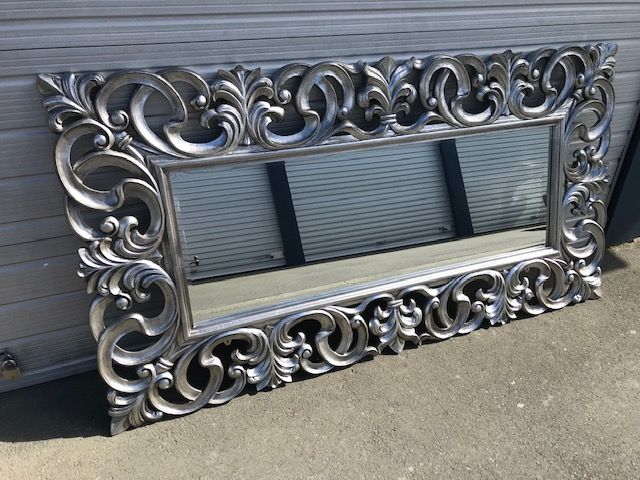Louis XV Mirror in silver leaf antiqued finish  This is a very large silver gilded mirror